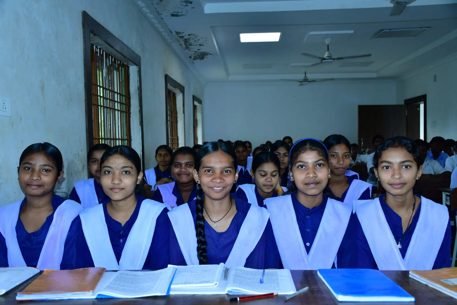 Secondary school girls at their desks during a lesson